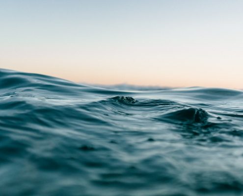 Ocean surface with morning yellow sky