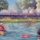 A rendering of the Charles River Floating Wetland depicting kayakers and birds by the wetland.