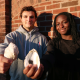 MIT Sea Grant students Santiago Borrego and Unyime Usua hold oyster shells.