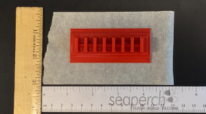 Inner features mold centered on a 5” length of 3” wide masking tape