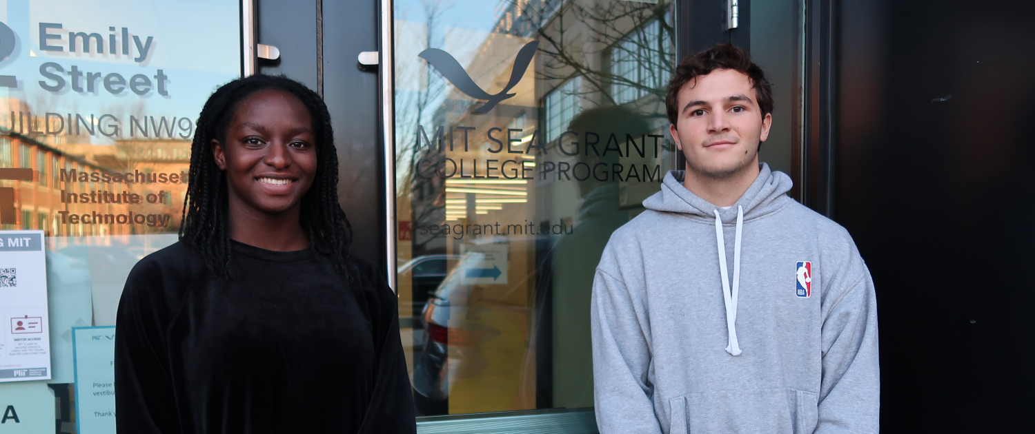 Unyime Usua and Santiago Borrego stand in front of MIT Sea Grant